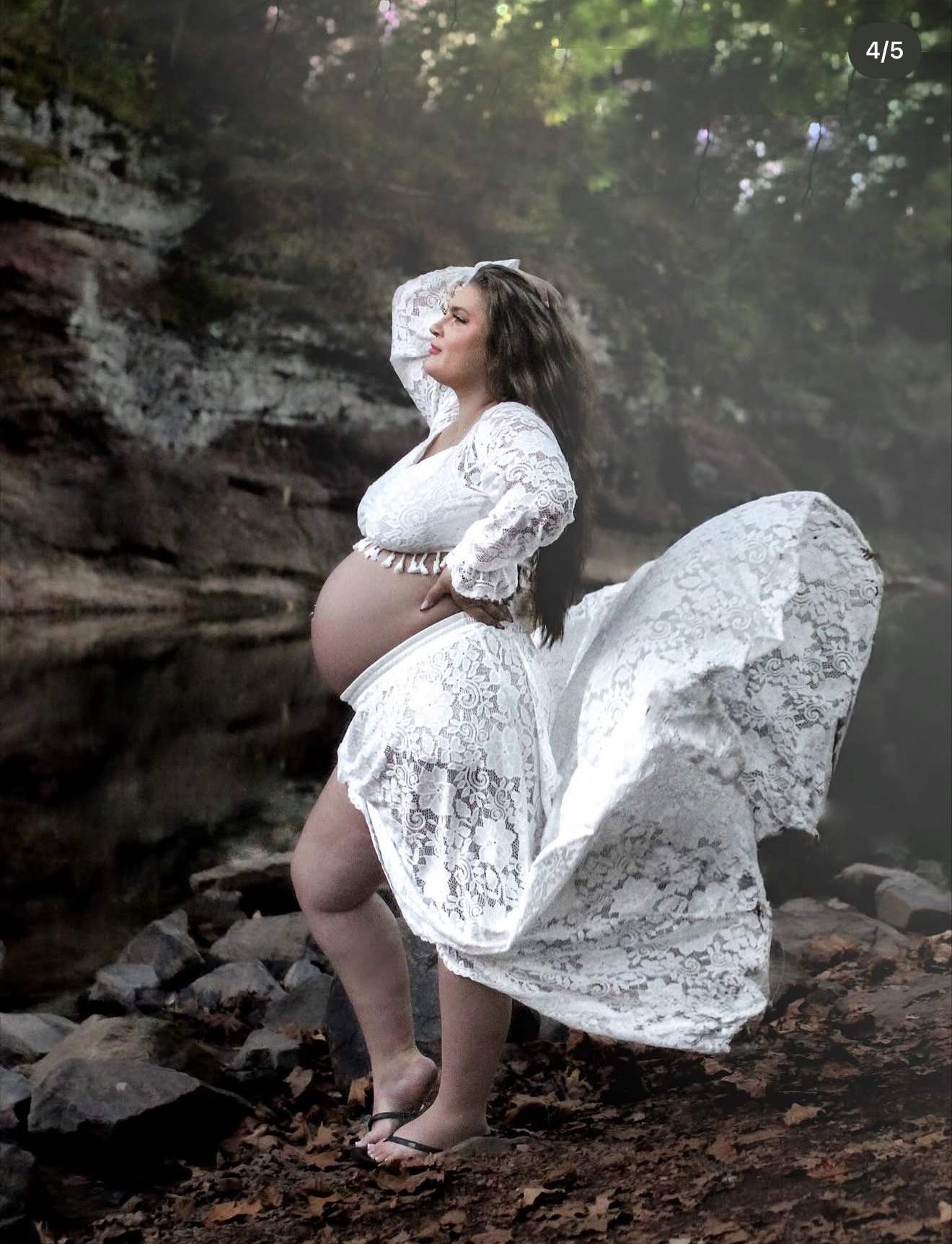 Lace maternity portrait among the rocks
